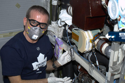 Space Plumber - replacing a low-temp cooling valve in the Columbus Lab.