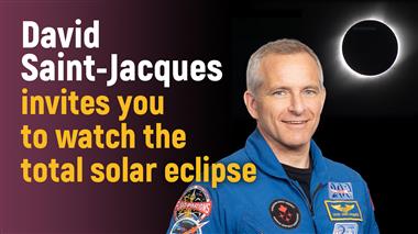 David Saint-Jacques on a dark sky showing a full solar eclipse